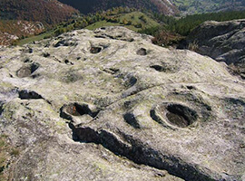 Holes carved in stone.