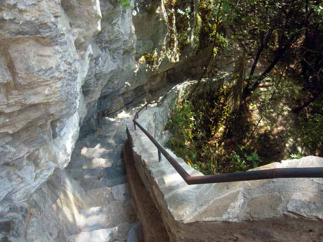 The winding staircase near the rock.